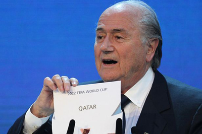 15279748FIFA-president-Joseph-Blatter-opens-the-envelope-to-reveal-that-Qatar-will-host-the-2022-Wo