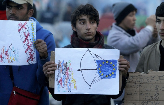 648x415_migrants-brandissent-dessins-alors-ue-turquie-negociation-bruxelles-propos-migrants-18-mars-2016-frontiere-macedo-grecque-idomeni